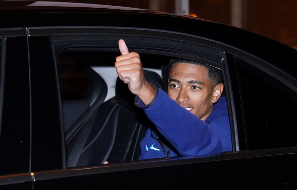 Jude Bellingham gives a thumbs up as he departs Birmingham Airport