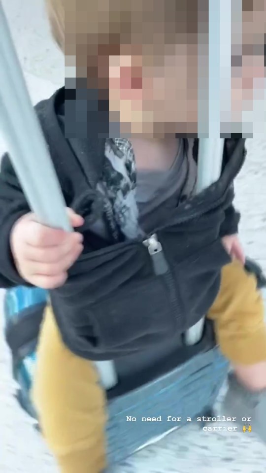 In a recent video, the savvy mum is seen transforming her carry-on case into a pushchair - and all you need is a hoodie