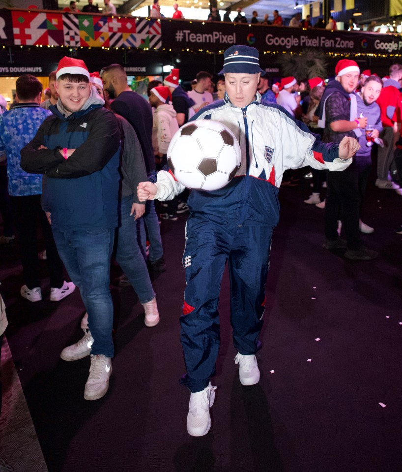 England fans having a kickabout at the fan zone at Boxpark Wembley