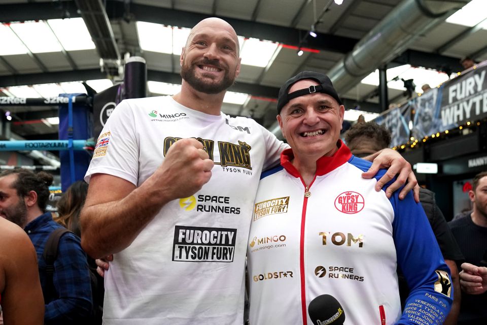 Tyson Fury pictured with his dad John