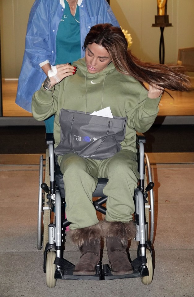 The mum of five was escorted to surgery in a wheelchair