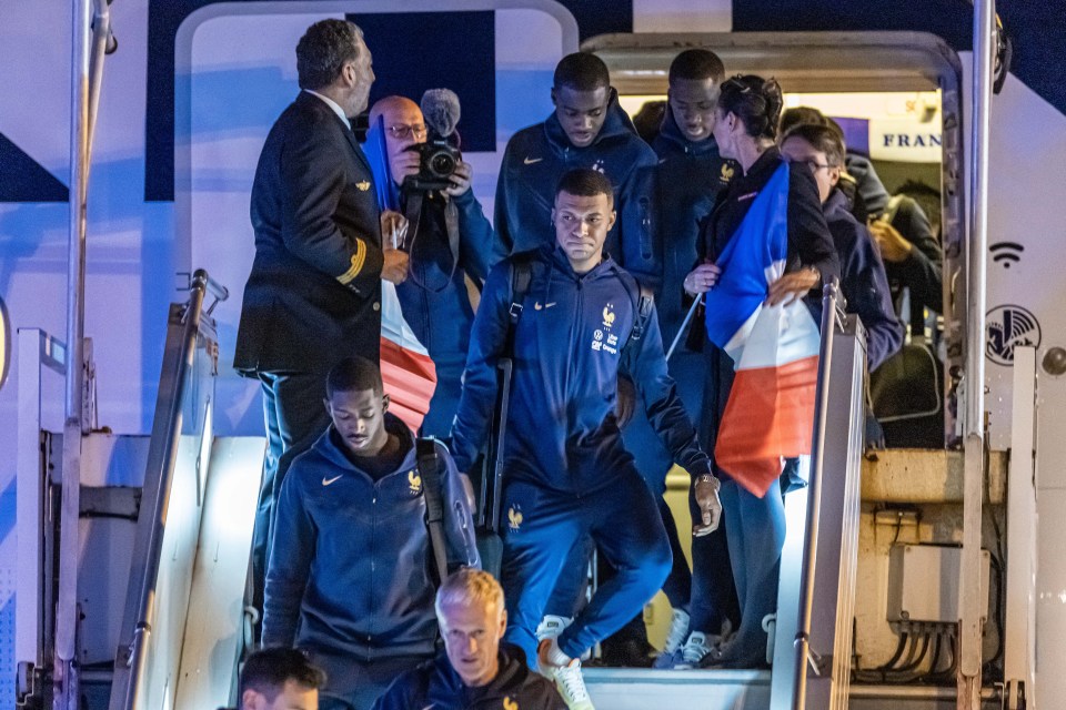 France stars exit their plane from Qatar