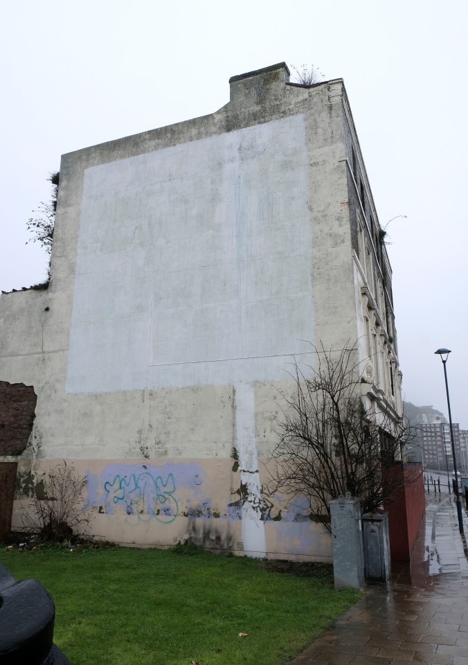 The local council want to rip down the wall where the Banksy art was painted