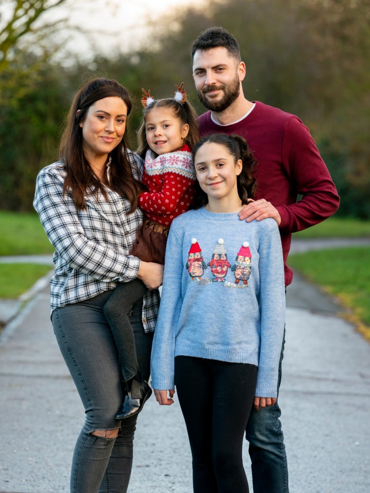 Georgia with mum Jodie, sister Millie, 11, and dad Adam