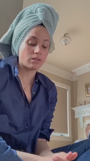 One clip shows an emotional Meghan with a towel wrapped around her head