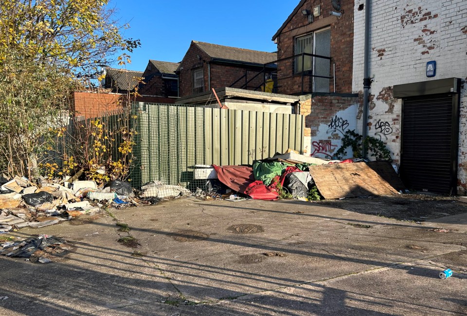 Rubbish is dumped outside a rundown building in Hodge Hill, near Birmingham