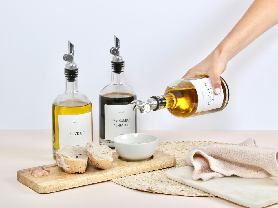 The prices for the glass oil/vinegar bottle with weighed 'pourer'start from £15