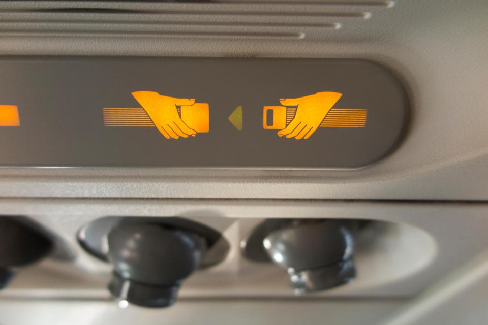 Some passengers remove their seatbelts to get more comfortable during flights