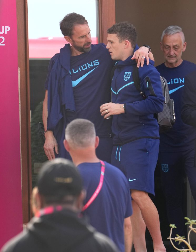 Southgate with an arm around Trippier