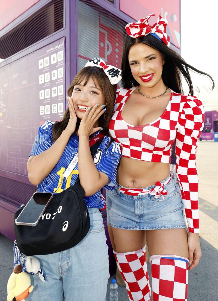 Knoll posing with a Japan fan outside Al Janoub Stadium in Al Wakrah, Qatar