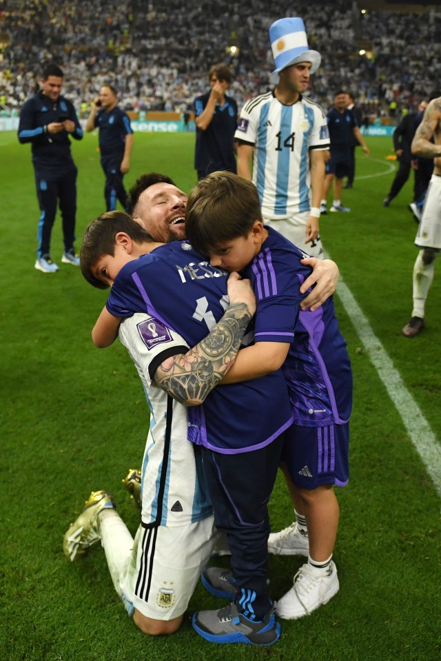 Lionel Messi tearfully embraced his two sons on the pitch following his World Cup win against France in the final