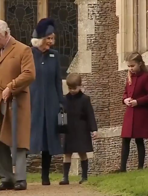 Prince Louis followed alongside the Queen Consort after the service in Sandringham