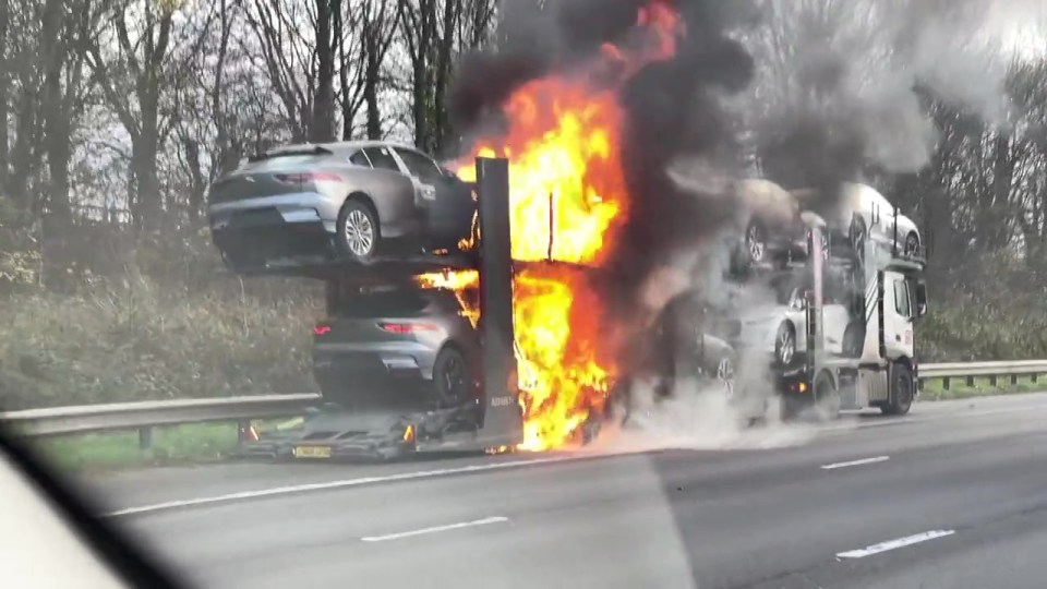 This is the moment a fleet of brand-new Jaguar SUVs worth hundreds of thousands of pounds went up in flames at the side of the M1