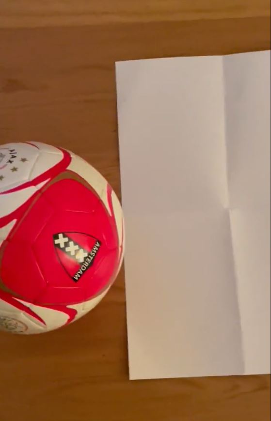 From overhead, it can be seen the ball and 'line' overlap