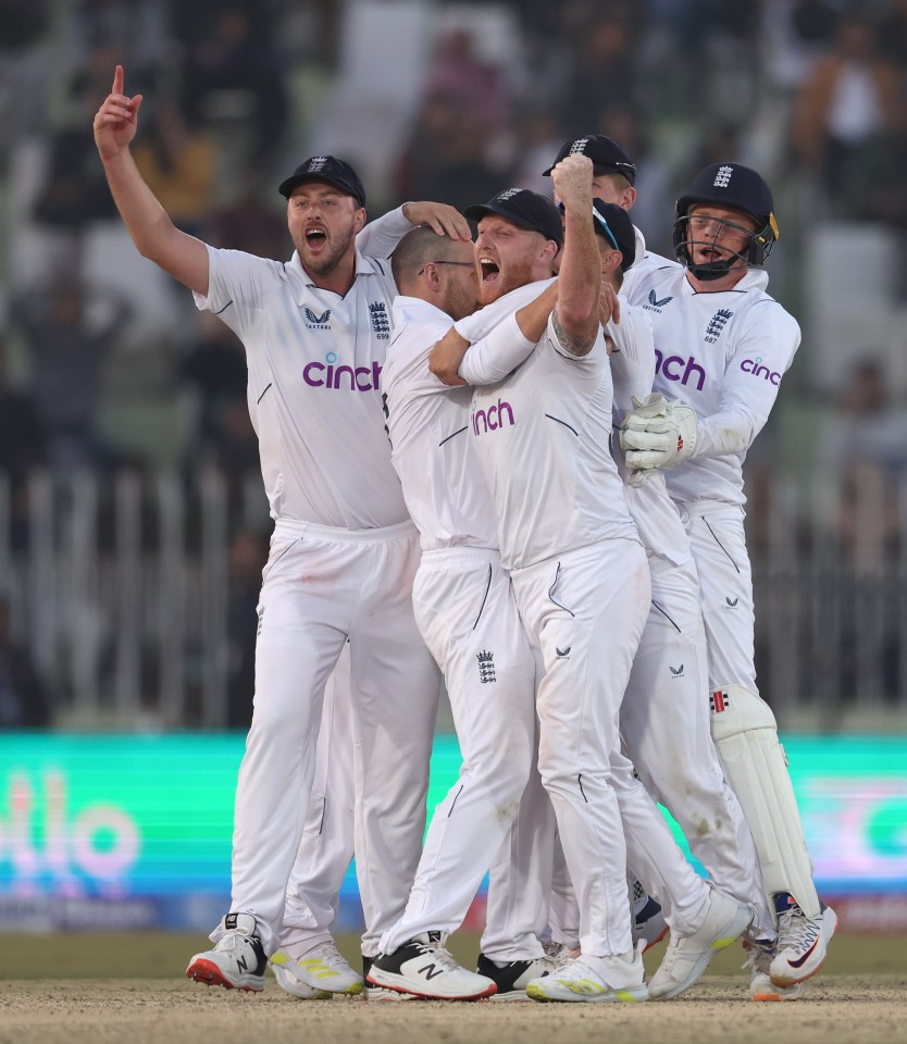 Jack Leach was mobbed by his team-mates in the fading light