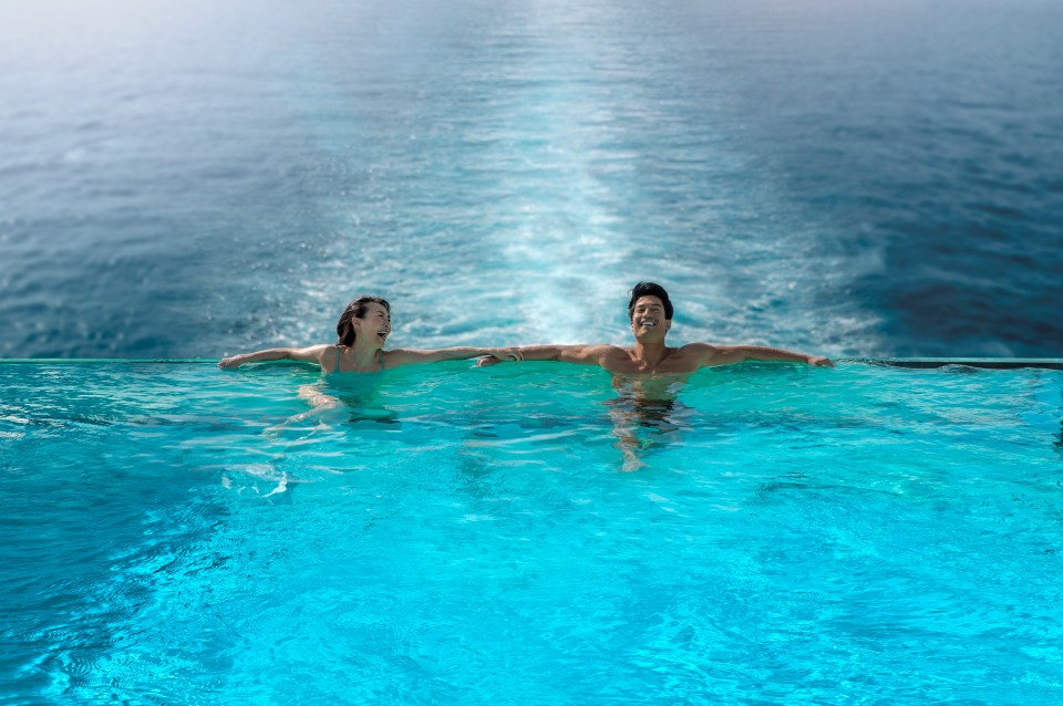 Relax in the ship's infinity pool or the SkyDome with a glass ceiling