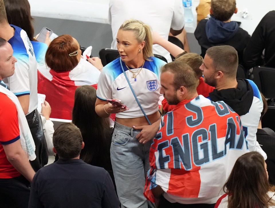 Phil Foden’s partner Rebecca Cooke wore an England shirt in the stands as she prepared for kick off