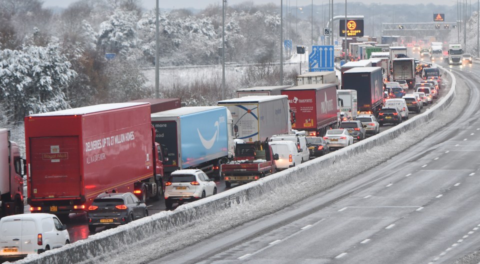 Motorists were stuck in standstill traffic near Essex on the M25 as snow brought delays of up to three hours