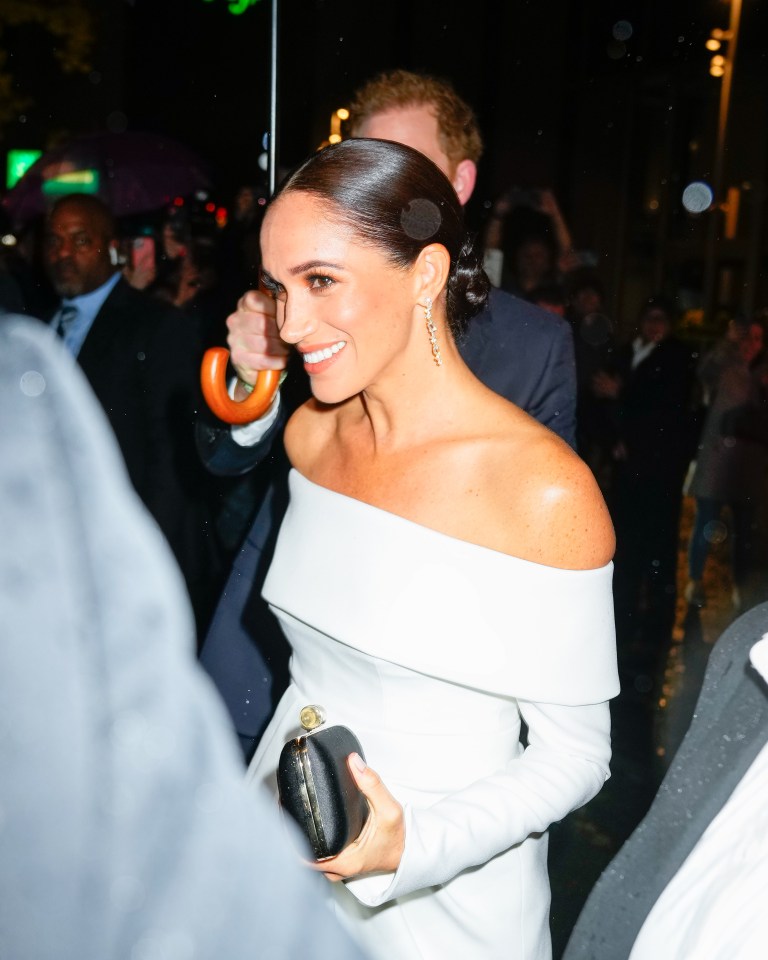 Meghan wore a strapless white dress for the event