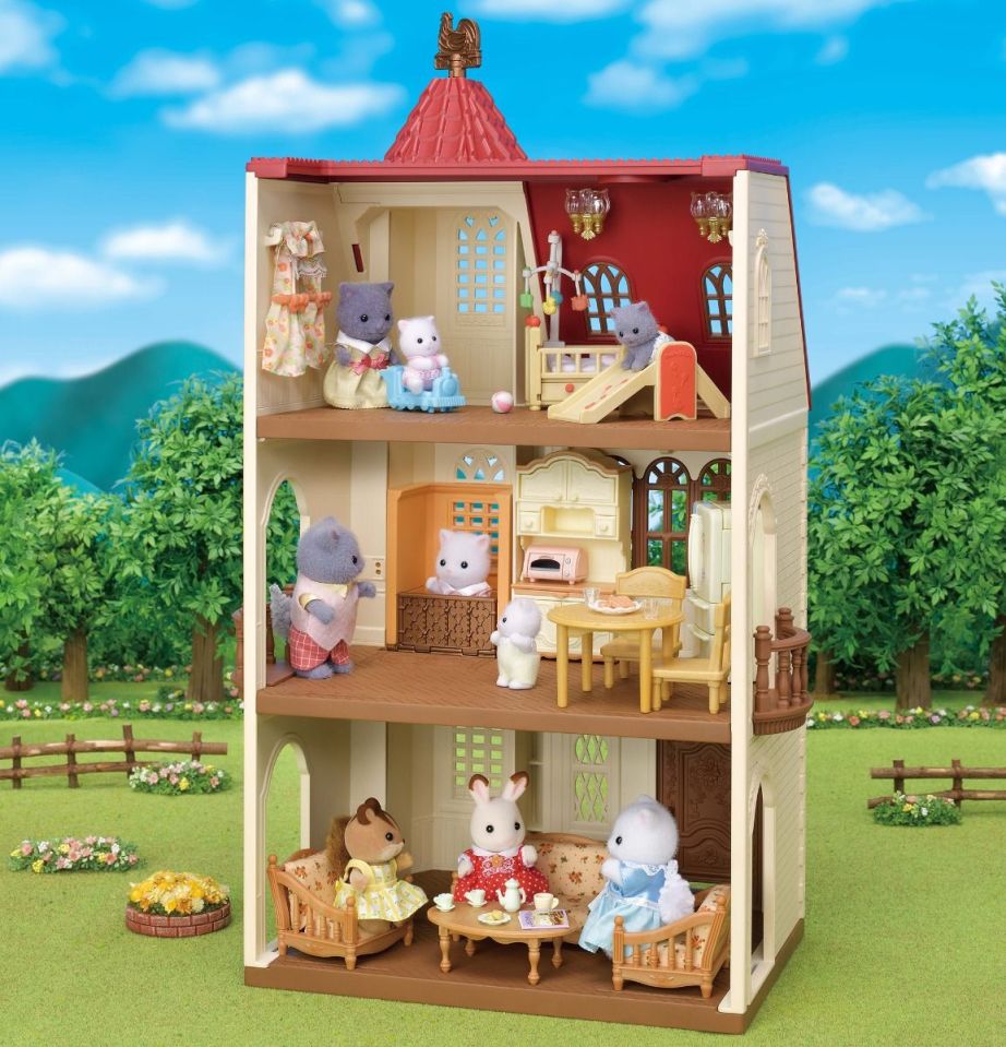 The toy house comes with a working lift