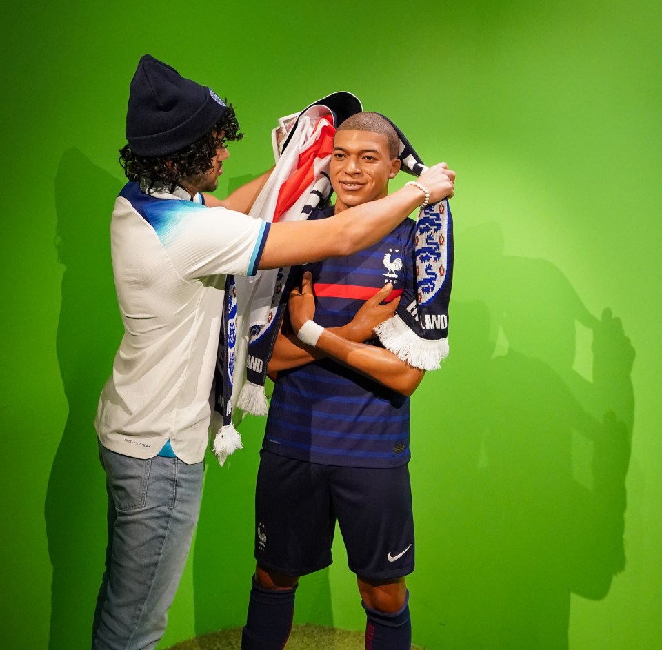 Sunman Joe Hadden draped Mbappe’s waxwork in England colours