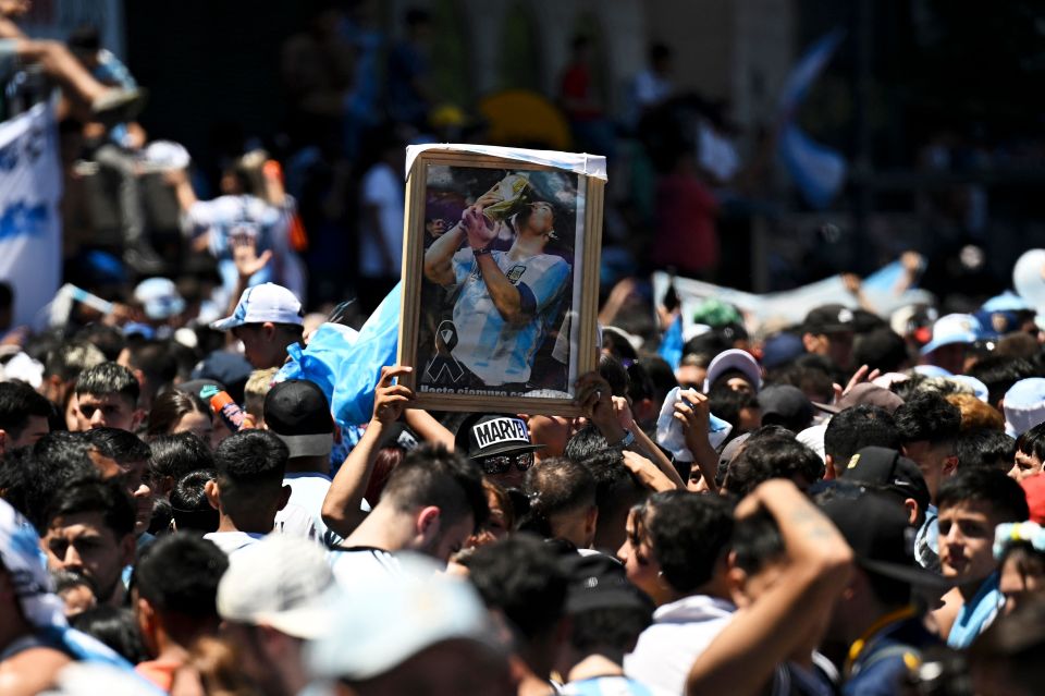 Pictures of Diego Maradona were held up ahead of the parade