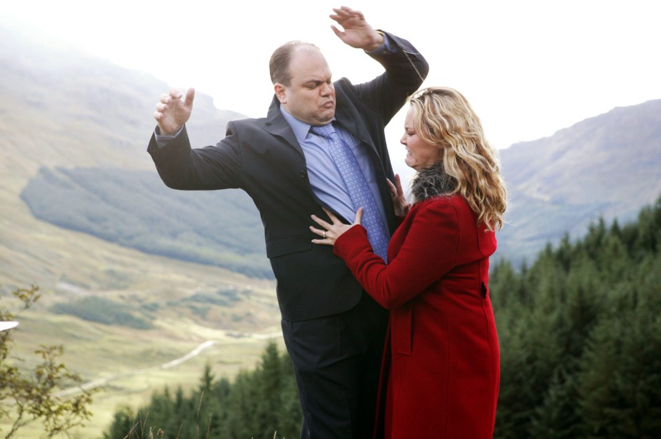 Iconic moment Janine Butcher murders Barry Evans by pushing him off a cliff