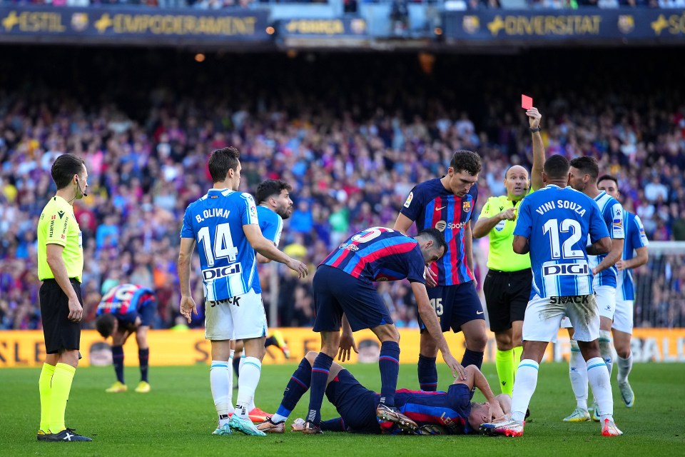 Card-crazy World Cup ref Antonio Mateu Lahoz showed 15 yellow cards and two red in the fiery 1-1 derby draw between Barcelona and Espanyol