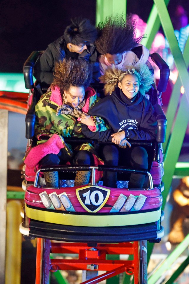 Mel is pictured screaming with her daughter Phoenix as she rides the rollercoaster