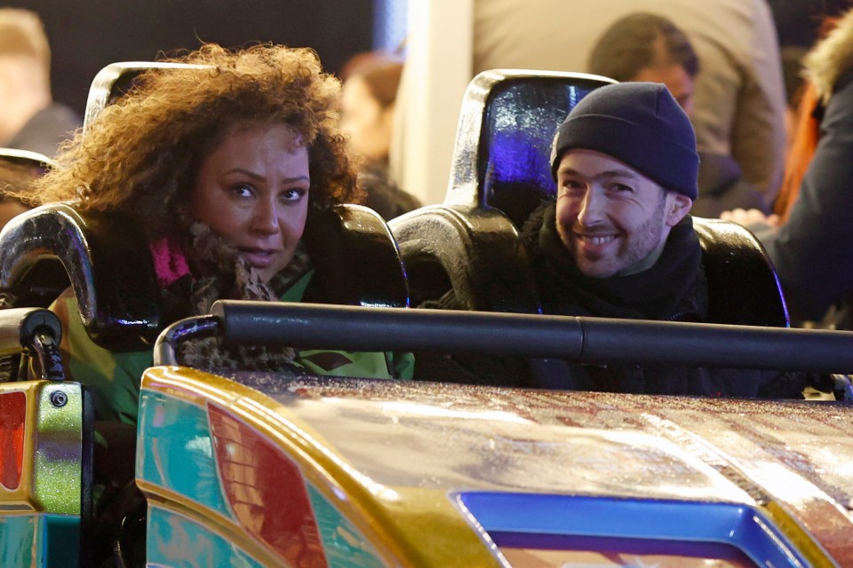 Mel and fiance Rory on board the fairground ride