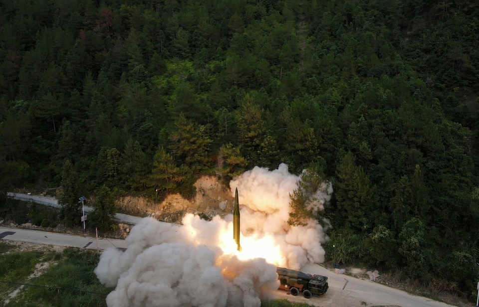 A projectile is launched in China during long-range live-fire drills