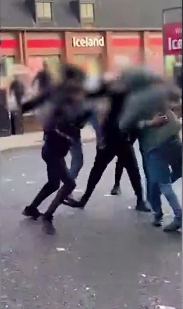 The shocking footage showed thugs brawling in the street