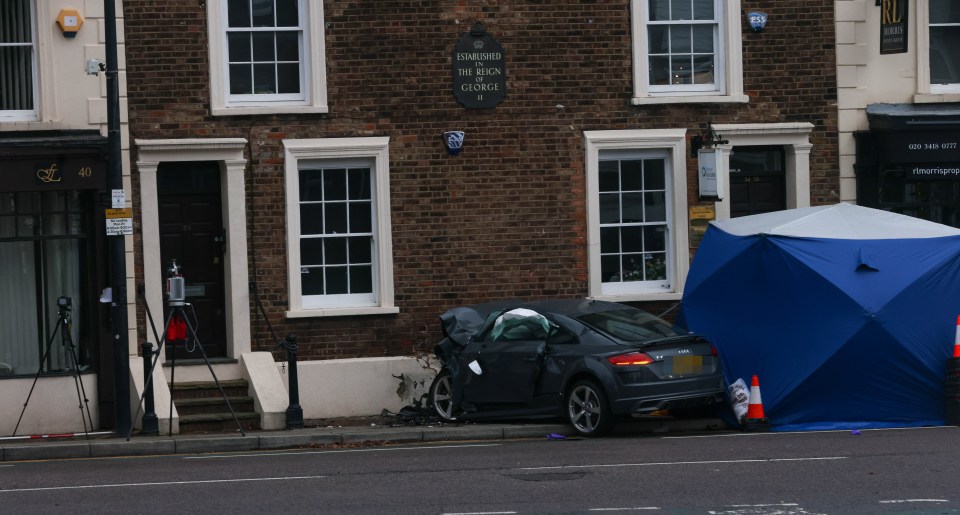 A man has died after his Audi smashed into a building in South Woodford