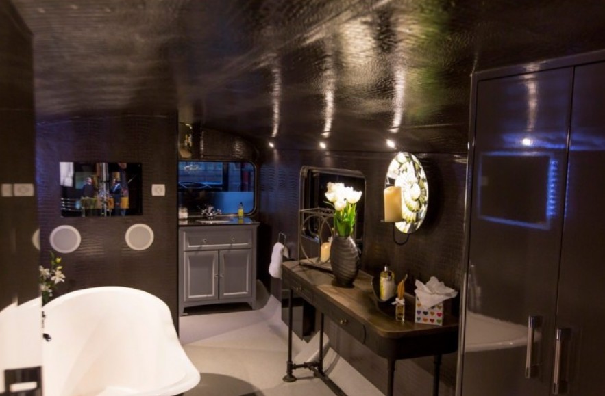 On the lower deck there's a roll-top bath and a flat-screen TV