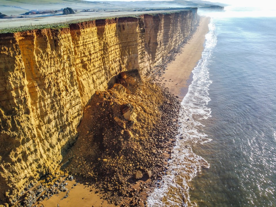 A huge rockfall continues to block the beach at West Bay in Dorset which happened on Wednesday this week