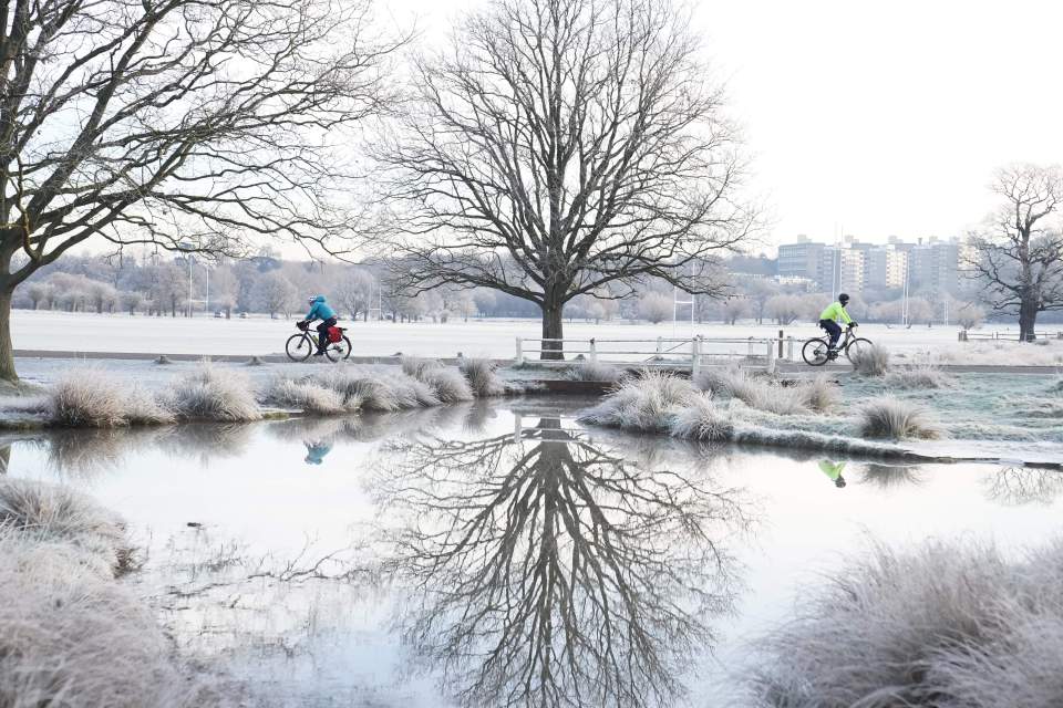 An icy Richmond Park in London pictured today amid cold weather warnings