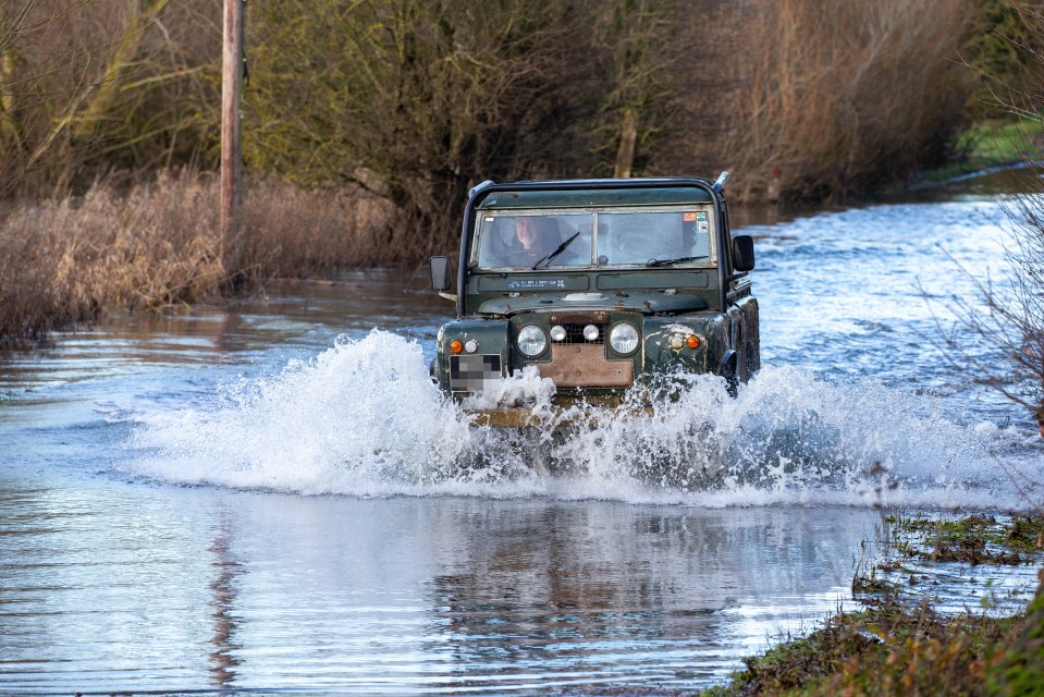 A flooded road in Sutton Gault in Cambridgeshire after the River Delph burst its banks