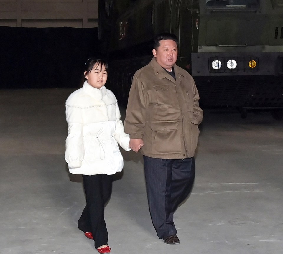 Kim with his daughter Ju-ae at a recent missile launch as he looks to consolidate his family's rule