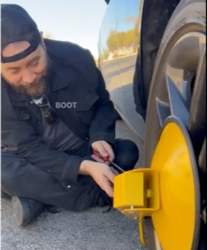 A man had his car clamped by his neighbour