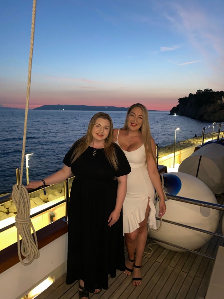 Alison and Amanda watch the sunset from onboard the  Salve Di Mare