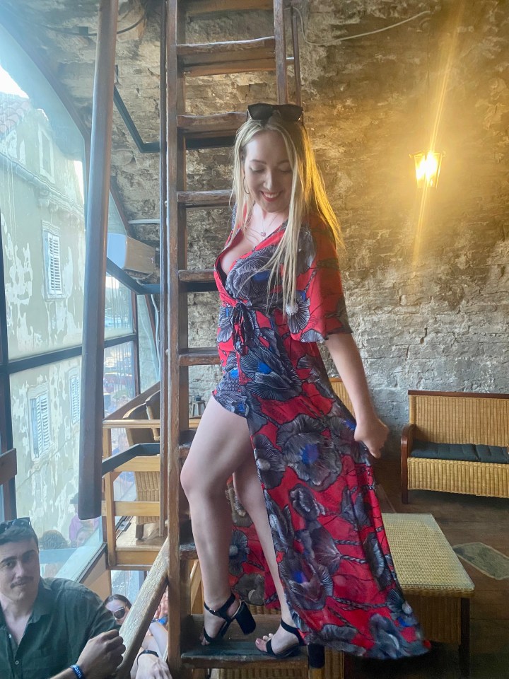 Climb a ladder to enter the bar within the 15th-century Zakerjan Tower