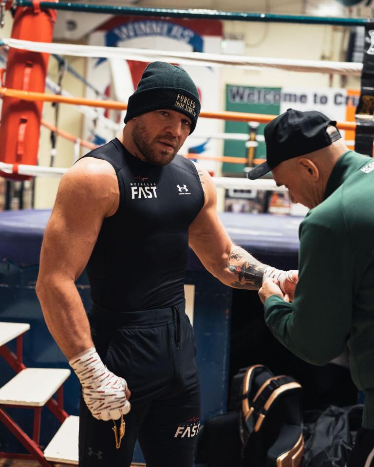 Conor McGregor revealed his bulking biceps on a return to his old gym