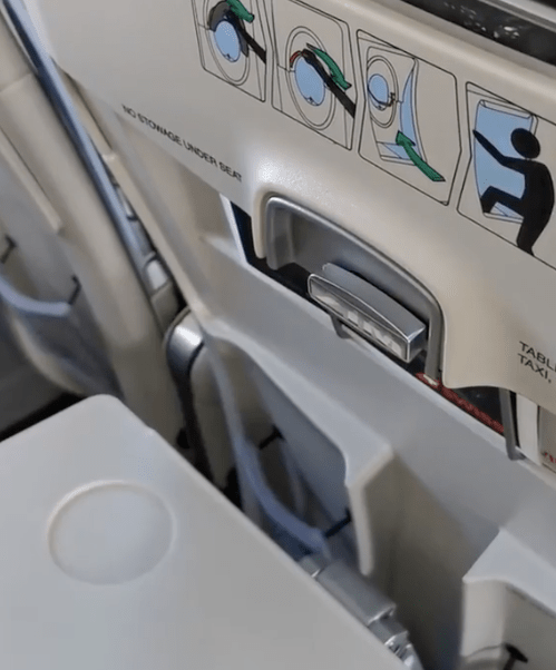 Swiss has revealed how the tray table latch is different in exit rows