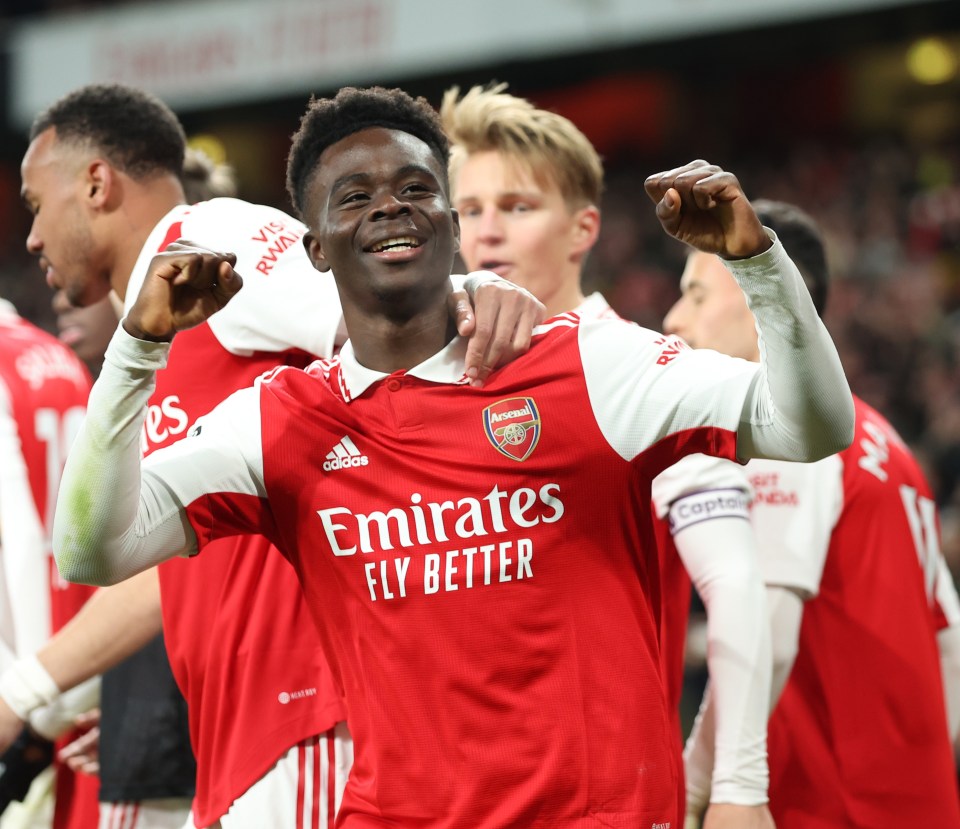 Saka celebrates scoring against Manchester United for the third game running