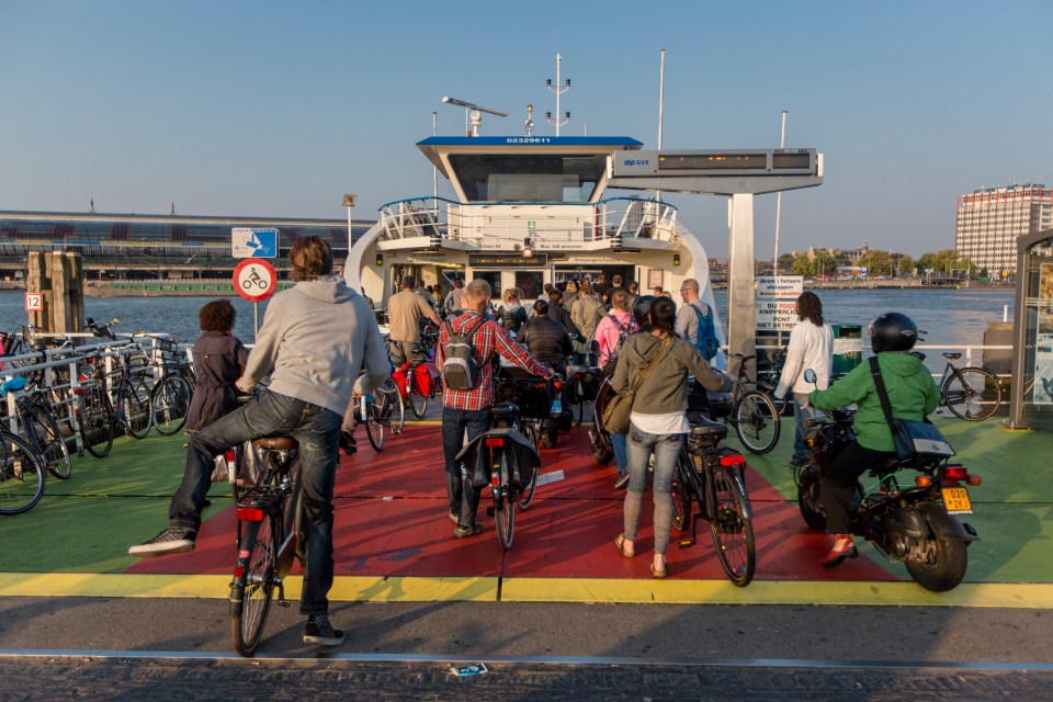 Behind Centraal Station free ferries regularly go to Buikslot­er­­weg in northern Amsterdam across the river IJ