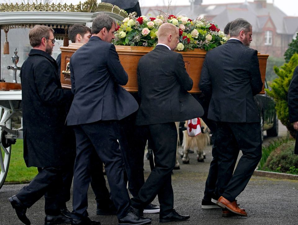 He helped carry her coffin into the church