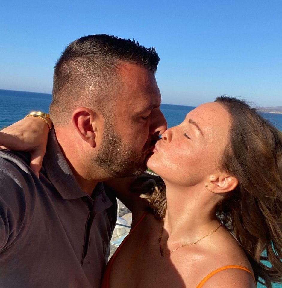 The couple shared a sweet kiss on holiday