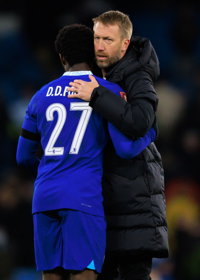 Current manager Graham Potter commiserates with new signing David Datro Fofana after Chelsea were humbled 4-0 at the Etihad