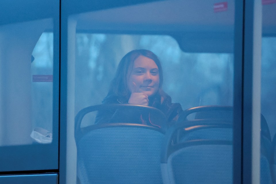 She was later pictured sitting alone on a bus