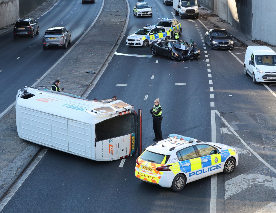 The van it crashed into lay on its side after the fierce collision